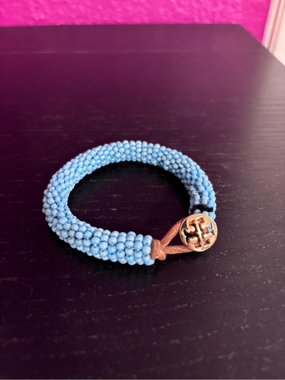 Tory Burch blue beaded bracelet with gold tone logo